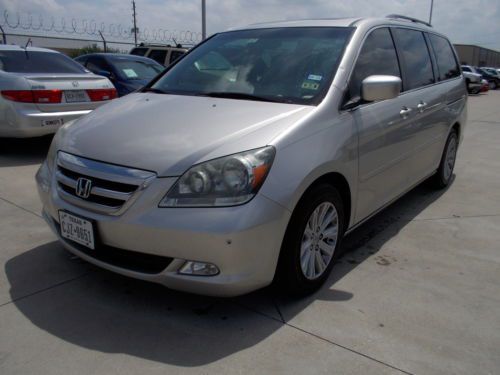 Honda odyssey 5dr touring , silver ,dvd, leather