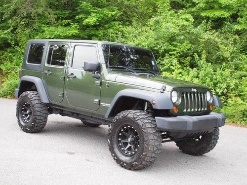 Green hard top automatic lifted custom aftermarket wheels and tires