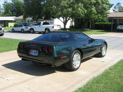 1995 polo green chevrolet corvette coupe with 52,000 orig. miles, sun&amp;reg. roof.
