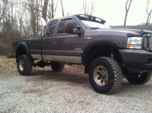 2004 ford f350 super duty turbo diesel, 83,000 miles, lifted, stacks