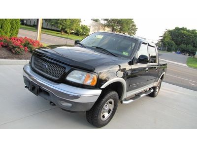 One owner!crew cab 4x4! xlt premium! serviced ! power pedals!no reserve !03
