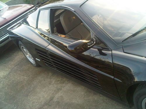 1991 black exterior, beige and black leather interior with kenwood stereo