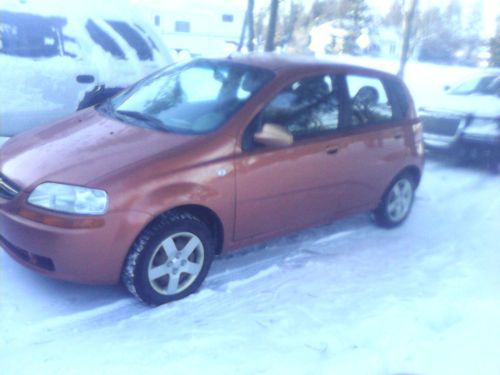 2005 chevy aveo low miles 2 owner!! cheap custom orange tons of extras new tires