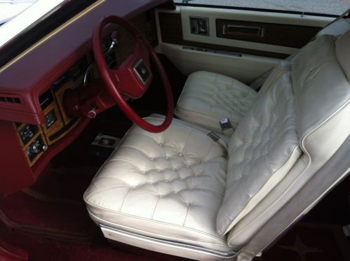 White cadillac eldorado biarritz 1984 v-8 with 33,000 miles mint