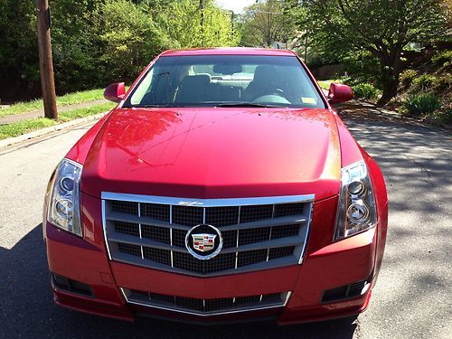 2011 certified cadillac cts luxury edition. red  with cash mire interior.