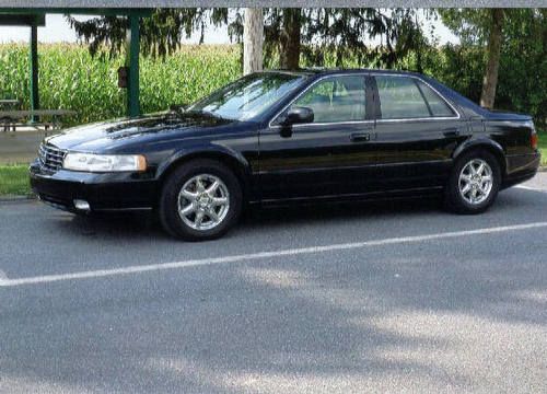 1999 cadillac sts florida car with 31,000 original miles black with ivory inter