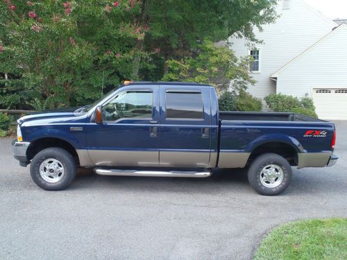 Fx4 4x4 low miles lariat 5.4l 8cyl blue metallic leather interior towing package