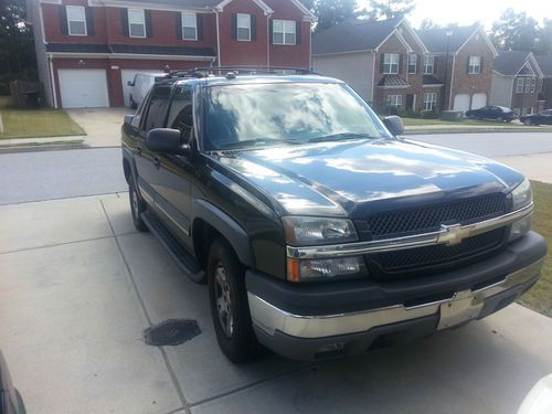 Charcoal grey, great condition, fully loaded, mostly highway miles