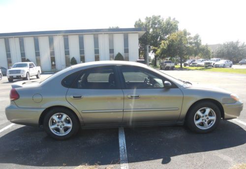 2006 ford taurus se sedan 4-door 3.0l cold a/c leather new tires needs nothing!