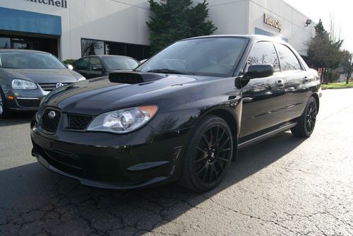 2006 subaru impreza wrx. aftermarket rims, aftermarket exhaust. turbo timer!