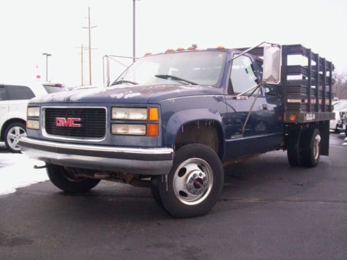 1995 gmc sierra 3500 four wheel drive flat stake bed, no reserve, going to sell!