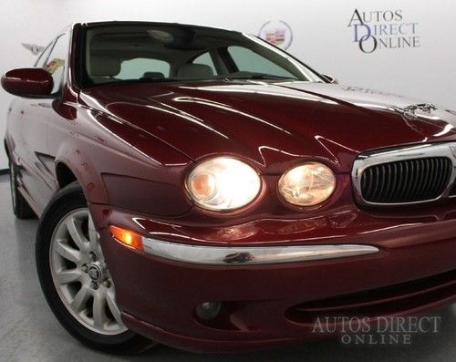 We finance 2003 jaguar x-type 2.5l awd 5spd clean carfax mroof pwrsts wrrnty cd