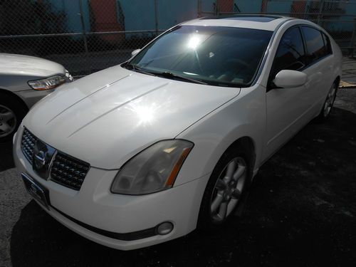 04 nissan maxima se 200k*the body is very good*engine is knocking* no reserve*