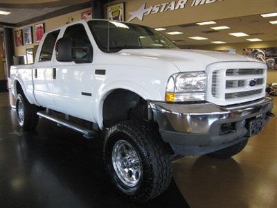2004 ford f250 crew cab short bed diesel 4x4 leather new rims and tires