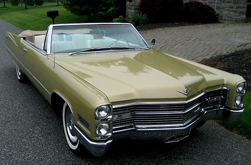 1966 convertible,stunning gold,white int.tan cloth top,full power,ac,autodim,exc