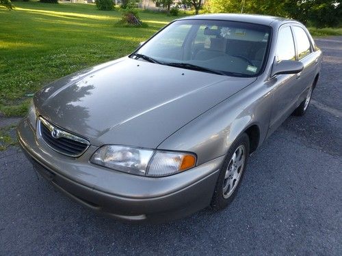 1999 mazda 626 lx 4 cylinder 30 mpg new transmission! cold a/c, low miles no res