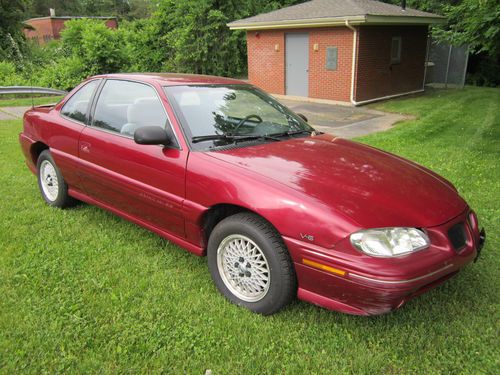 1997 pontiac grand am se coupe 2-door 3.1l ***very low miles***