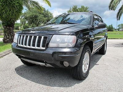04 grand cherokee special edition v8 4x4 new tires cd stacker fl suv low reserve