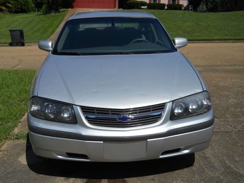 Silver,4door,good condition,low miles,clean,new wind shield,new back window