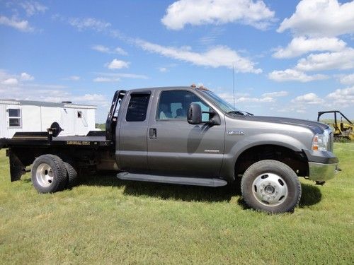 Ford f350 hay truck 6.0 diesel 4x4 duals supercab hydraulic flatbed used