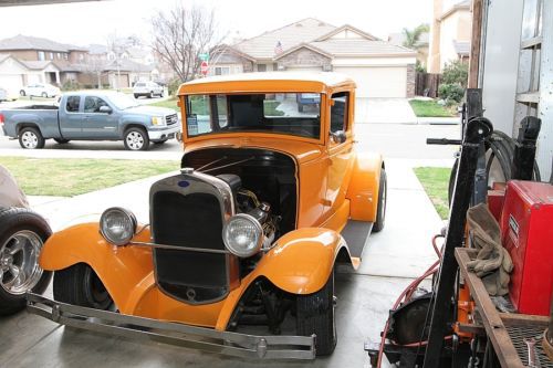 1931 ford coupe, steel body, orange