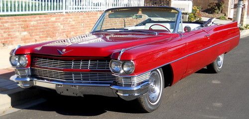 Convertible , rebuilt engine , red body with white interior