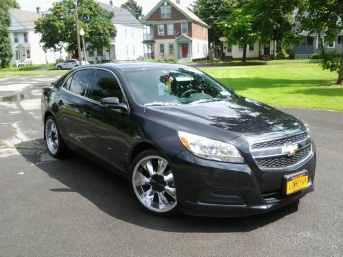 I&#039;m selling my chevy malibu with 20 inch rims included. only 7,671 very low mile