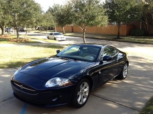 Dark blue coupe, 9,000 miles, great condition