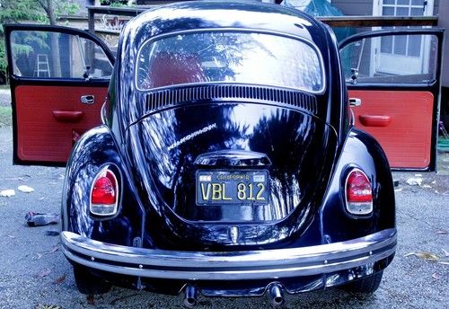 Vw bug,  original black, sunroof, completely restored, red interior, beautiful