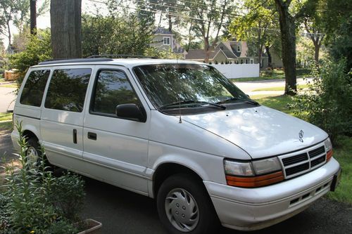 White minivan in good condition and runs very well.