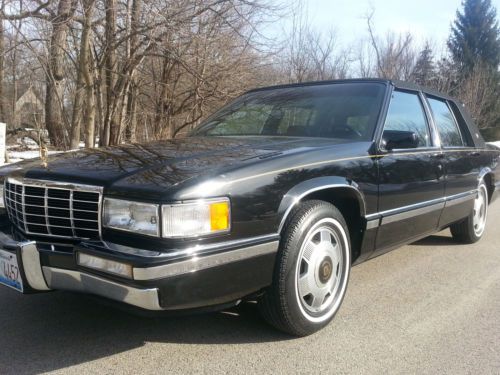 1993 cadillac deville , super low miles, 24,000, triple black no rust