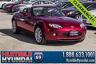 Very clean and 15k orig mi! 6-spd manual 2.0l red touring mx5!