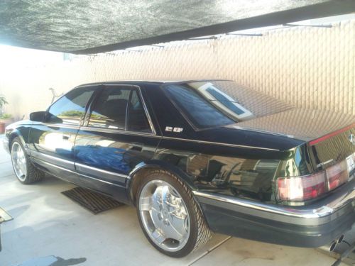 1996 cadillac seville sls sedan 4-door 4.6l green