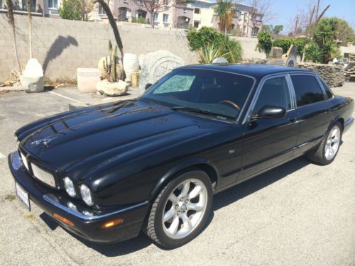 Supercharged xjr southern california black black beauty 91k low miles supercat!