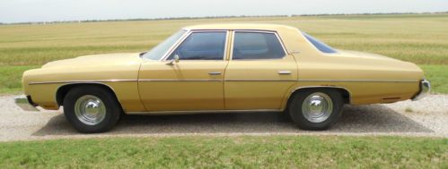 1973 chevrolet chevy impala 4-door sedan