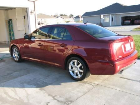 2005 cadillac sts luxury perfomance 4.6l red, excellent condition, low miles