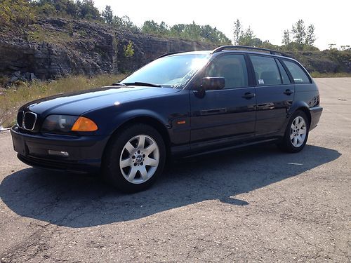 2000 bmw 323i wagon 4-door 2.5l fully loaded very clean great on gas no reserve!