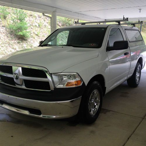 White leer topper linex bed liner utility work camping truck