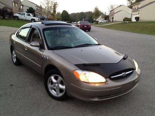 02 ford taurus ses / leather / roof/ loaded/ cold a/c / low reserve