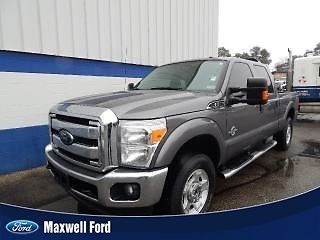 12 ford super duty f250  4x4 crew cab, aftermarket leather seats, we finance!