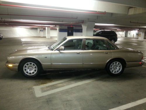 2000 gold jaguar xj8 with only 95,000+- miles on it, runs great, drive anywhere