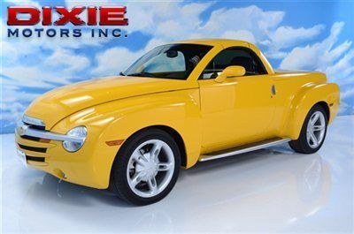 Convertible retractable hardtop, leather, running boards low miles