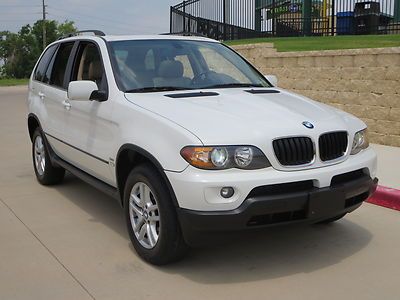 Look at this texas own 2004 bmw awd low miles with panarama sunroof