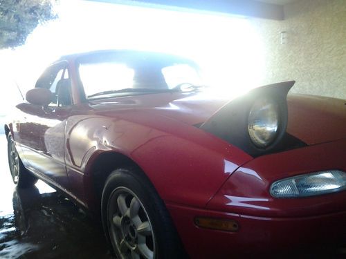 1990 mazda miata red lots of extras and a 1.8 liter swap done by flyin' miata