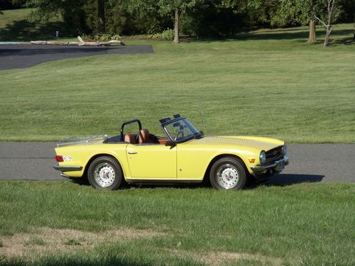 1974 triumph tr6, yellow with matching hardtop, tan interior, black soft top.