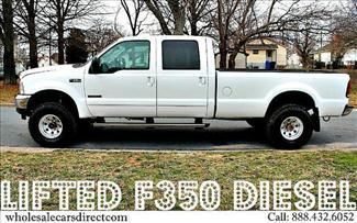 Used ford f 350 crew cab powerstroke turbo diesel 4x4 pickup trucks we finance