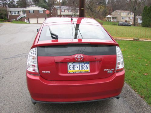 Candy red prius with 6-cd changer jbl sound system and external gps