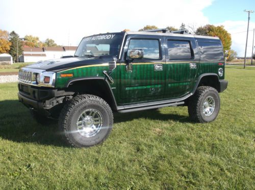 2005 hummer h2, lifted, custom marble kandy paint