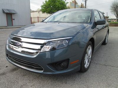 2013 fusion se only 11k clean inside and out runs and drives excellent no reserv
