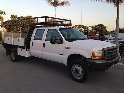 7.3 liter diesel 10' flatbed crew cab 176" long wb utility service dually truck